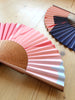 A Ginkgo Pop Sahara Handmade Fan from modern stationery brand Common Modern